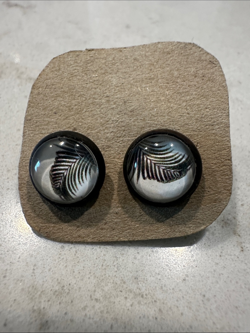 Black Round Glass Stud Earrings with Feather Motif